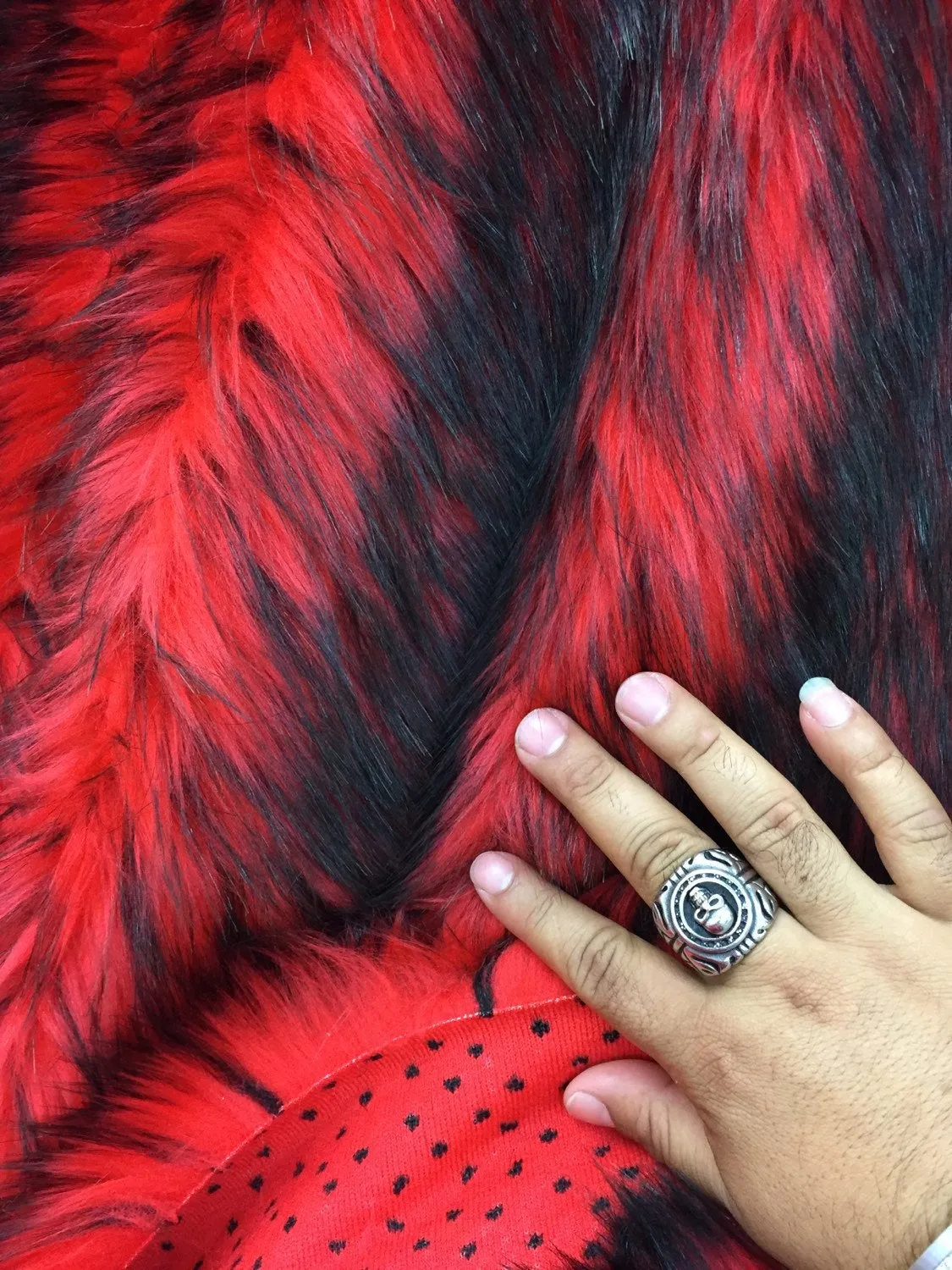 Red/black husky faux fur, 2 tone shaggy faux fur. Sold by the yard. 60" wide.