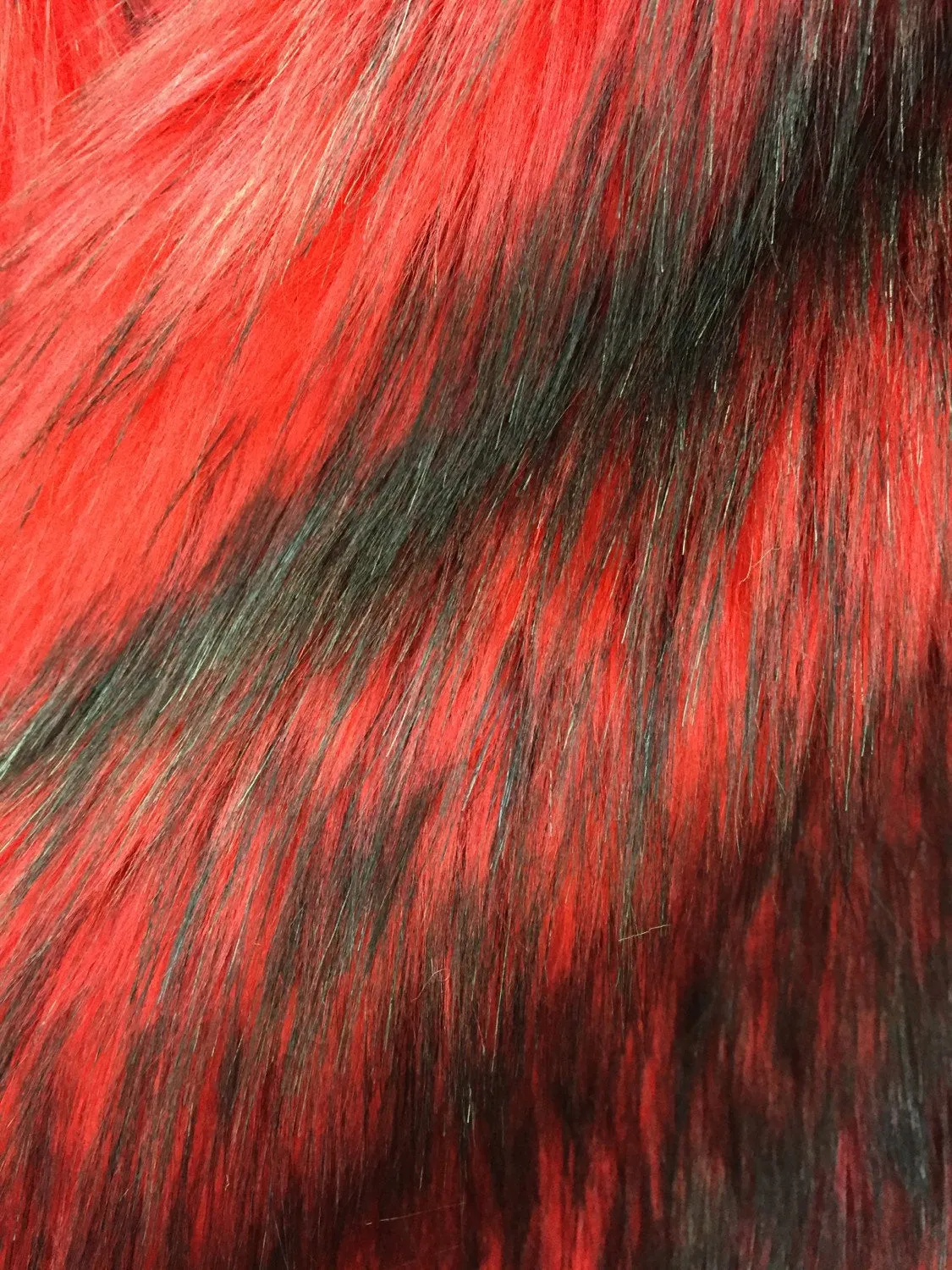 Red/black husky faux fur, 2 tone shaggy faux fur. Sold by the yard. 60" wide.